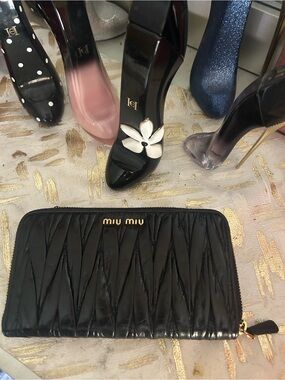 Miu Miu Black Matelassé Zip Wallet with Gold Logo